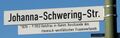 Straßenschild mit Erklärtafel 2023
