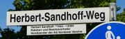 Strassenschild Herbert Sandhoff Weg.jpg