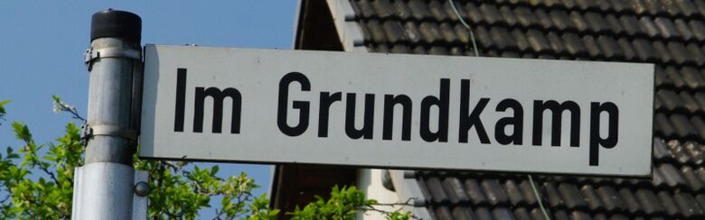 Straßenschild Im Grundkamp