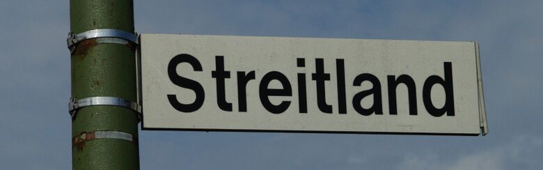 Straßenschild Streitland