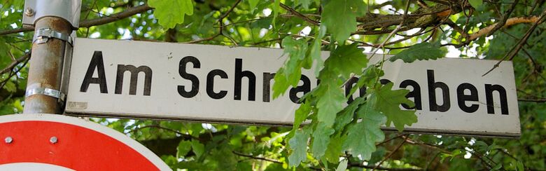 Straßenschild Am Schräggraben